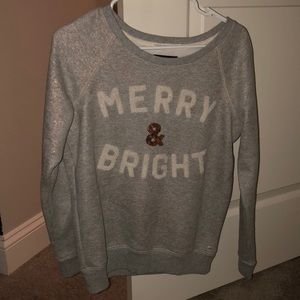 “Merry & Bright” grey sweater from American Eagle